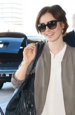 LILY COLLINS Arrives at LAX Airport in Los Angeles 11/08/2015