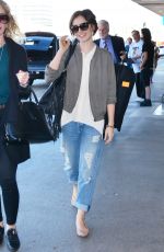 LILY COLLINS Arrives at LAX Airport in Los Angeles 11/08/2015