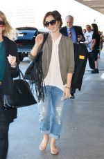 LILY COLLINS Arrives at LAX Airport in Los Angeles 11/08/2015