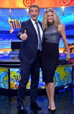 MICHELLE HUNZIKER at Strip The News Photocall in Milan 10/26/2015