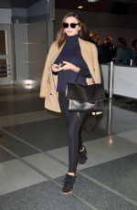 MIRANDA KERR Arrives at JFK Airport in New York 11/15/2015
