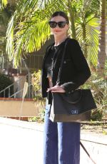 MIRANDA KERR Walks Her Dog Out in Los Angeles 11/21/2015