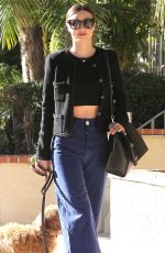 MIRANDA KERR Walks Her Dog Out in Los Angeles 11/21/2015