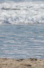 NICOLE WILLIAMS in Bijini on the Set of a Photoshoot at a Beach in Los Angeles 11/13/2015