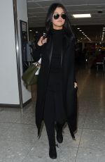 SELENA GOMEZ at Heathrow Airport in London 11/12/2015