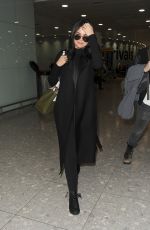 SELENA GOMEZ at Heathrow Airport in London 11/12/2015