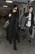 SELENA GOMEZ at Heathrow Airport in London 11/12/2015