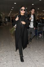 SELENA GOMEZ at Heathrow Airport in London 11/12/2015