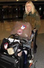 ALICE EVE at Los Angeles International Airport 12/15/2015