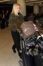 ALICE EVE at Los Angeles International Airport 12/15/2015