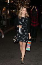 AMANDA SEYFRIED with a Bunny Shopping at The Groove in Los Angeles 12/08/2015