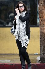 ANNE HATHAWAY Out and About in Los Angeles 12/22/2015