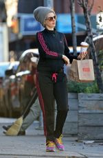 ANNE HATHAWAY Out and About in New York 12/16/2015