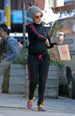 ANNE HATHAWAY Out and About in New York 12/16/2015