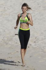 BEHATI PRINSLOO on the Set of a Photoshoot at the Beach in St. Barths 12/10/2015