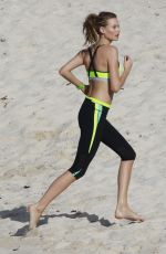 BEHATI PRINSLOO on the Set of a Photoshoot at the Beach in St. Barths 12/10/2015