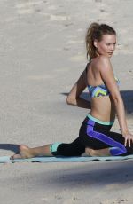 BEHATI PRINSLOO on the Set of a Photoshoot at the Beach in St. Barths 12/10/2015