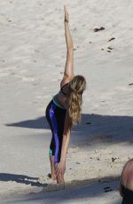 BEHATI PRINSLOO on the Set of a Photoshoot at the Beach in St. Barths 12/10/2015