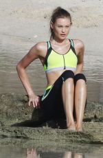 BEHATI PRINSLOO on the Set of a Photoshoot at the Beach in St. Barths 12/10/2015