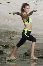 BEHATI PRINSLOO on the Set of a Photoshoot at the Beach in St. Barths 12/10/2015