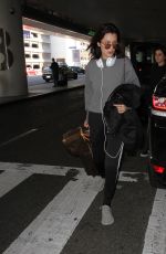 BELLA HADID at LAX Airport in Los Angeles 12/17/2015