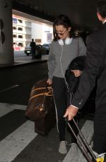BELLA HADID at LAX Airport in Los Angeles 12/17/2015