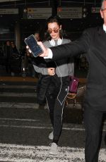 BELLA HADID at LAX Airport in Los Angeles 12/17/2015