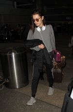BELLA HADID at LAX Airport in Los Angeles 12/17/2015