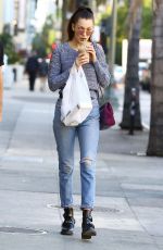BELLA HADID in Ripped Jeans Out Shopping in Los Angeles 12/23/2015