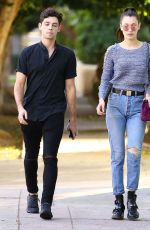BELLA HADID in Ripped Jeans Out Shopping in Los Angeles 12/23/2015
