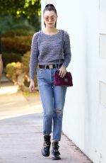 BELLA HADID in Ripped Jeans Out Shopping in Los Angeles 12/23/2015
