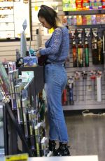 BELLA HADID in Ripped Jeans Out Shopping in Los Angeles 12/23/2015