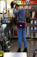 BELLA HADID in Ripped Jeans Out Shopping in Los Angeles 12/23/2015