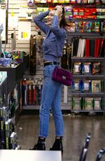 BELLA HADID in Ripped Jeans Out Shopping in Los Angeles 12/23/2015