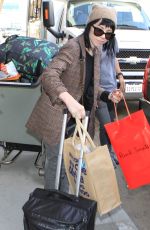 CARLY RAE JEPSE Arrives at LAX Airport in Los Angeles 12/08/2015