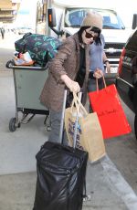 CARLY RAE JEPSE Arrives at LAX Airport in Los Angeles 12/08/2015