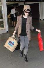 CARLY RAE JEPSE Arrives at LAX Airport in Los Angeles 12/08/2015