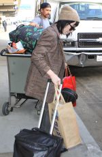 CARLY RAE JEPSE Arrives at LAX Airport in Los Angeles 12/08/2015
