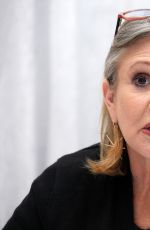 CARRIE FISHER at Star Wars: The Force Awakens Press Conference in Los Angeles 12/04/2015