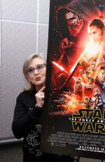 CARRIE FISHER at Star Wars: The Force Awakens Press Conference in Los Angeles 12/04/2015