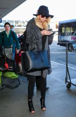 CHARLOTTE MCKINNEY at LAX Airport in Los Angeles 12/27/2015