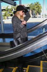 CHARLOTTE MCKINNEY at LAX Airport in Los Angeles 12/27/2015