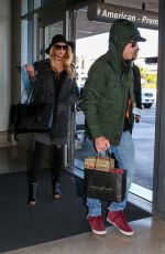 CHARLOTTE MCKINNEY at LAX Airport in Los Angeles 12/27/2015