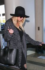 CHARLOTTE MCKINNEY at LAX Airport in Los Angeles 12/27/2015