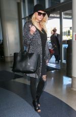 CHARLOTTE MCKINNEY at LAX Airport in Los Angeles 12/27/2015