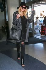 CHARLOTTE MCKINNEY at LAX Airport in Los Angeles 12/27/2015