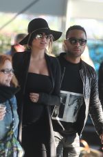 CHRISSY TEIGEN at Charles De Gaulle Airport in Paris 12/27/2015