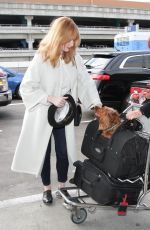 CHRISTINA HENDRICKS at LAX Airport in Los Angeles 12/11/2015