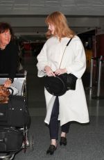 CHRISTINA HENDRICKS at LAX Airport in Los Angeles 12/11/2015