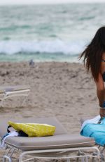 CLAUDIA ROMANI in Blue Bikini at a Beach in Miami 11/30/2015